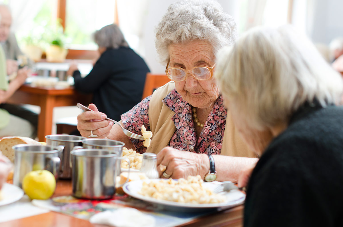 Senior Eating a Meal at VRS Seniors Independent Living Community